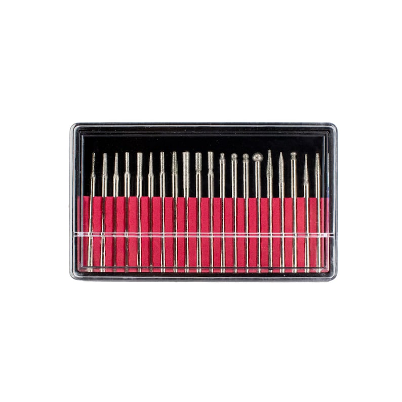 May include: A clear plastic case containing a set of 20 silver metal drill bits with various shapes and sizes. The drill bits are arranged in rows and are held in place by a red foam backing.