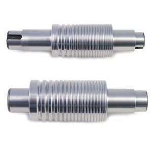 May include: Two silver-colored metal cylindrical components. Each component has a ridged, central section and smooth, cylindrical ends. One end of each component has a slotted design.