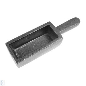 May include: A gray metal casting mold with a handle. The mold is designed to create a rectangular bar of metal.