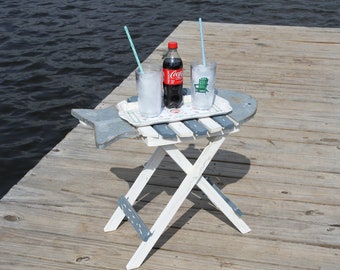 Unique folding fish table, all wood, distressed with a metal tin head and tail, poolside,patio,deck,seaside.  Very durable and sturdy!