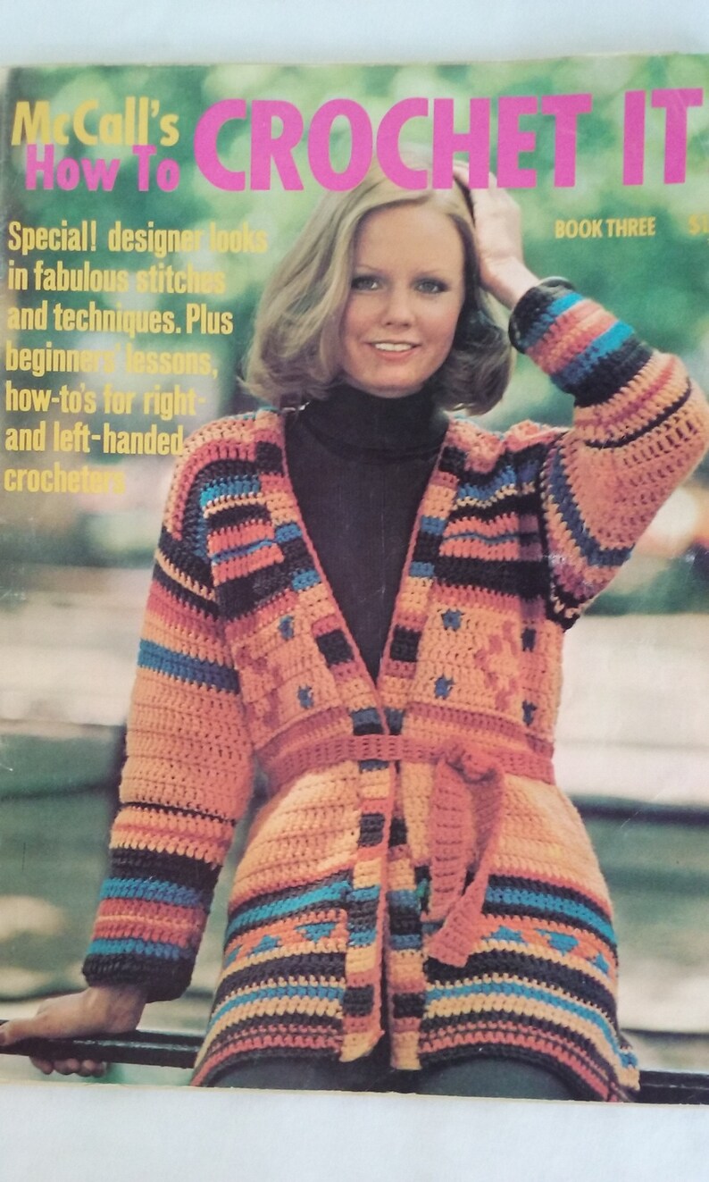 May include: A crochet book cover featuring a woman wearing a colorful crocheted cardigan with a belt. The book title is "McCall's How To Crochet It Book Three".