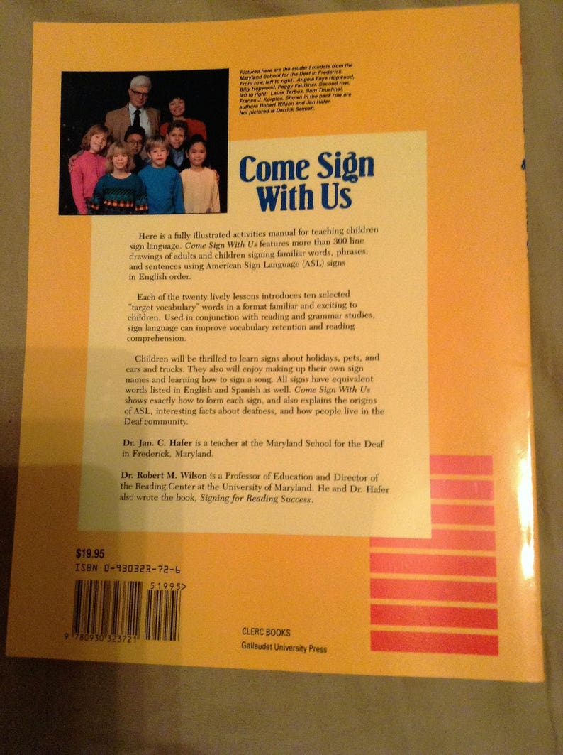 May include: A yellow and orange book cover with the title "Come Sign With Us". The book cover features a group of children and adults signing in American Sign Language (ASL). The book is a fully illustrated activities manual for teaching children sign language. The book cover also includes the ISBN number, price, and author information.