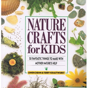 May include: Book cover with the title "Nature Crafts for Kids" and a subtitle "50 Fantastic Things to Make with Mother Nature's Help". The cover features a variety of natural elements, including shells, leaves, rocks, and flowers.