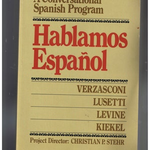 May include: A yellow book cover with the title "Hablamos Español" in red letters. The book is a conversational Spanish program with the names of the authors: Verzasconi, Lusetti, Levine, and Kiekel. The project director is Christian P. Stehr.