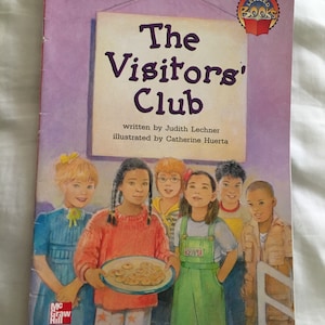 May include: A book cover with the title "The Visitors' Club" written in purple text. The cover features a group of children, including a girl holding a plate of cookies. The book is part of a leveled reading series.