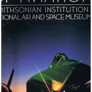 May include: Aviation-themed poster with the text "Milestones of Aviation" and "Smithsonian Institution National Air and Space Museum." The image features a dark green aircraft with bright light streaks against a blue and orange gradient background.