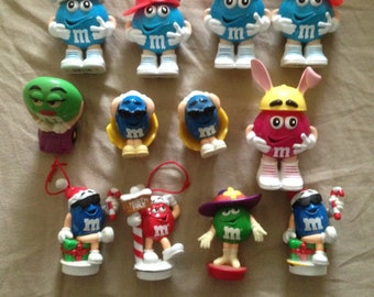 M & M  Mars 12  Figurines Collection of Toppers, Toys and Candy Holders Souvenir Memorabilias