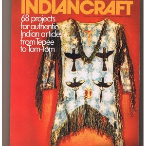 May include: A book cover with a red background and the title "The Complete How-To Book of Indiancraft" in yellow letters. The cover features a colorful Native American garment with fringe and black bird designs.