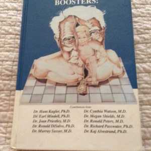 May include: A blue book with the title "Life Extenders and Memory Boosters!"  The cover features an illustration of an older man holding a younger child. The book lists the names of several doctors who contributed to the book.