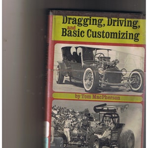 May include: A book titled "Dragging, Driving, and Basic Customizing" by Tom MacPherson. The cover features a black and white photo of a vintage hot rod car and a photo of a dragster.
