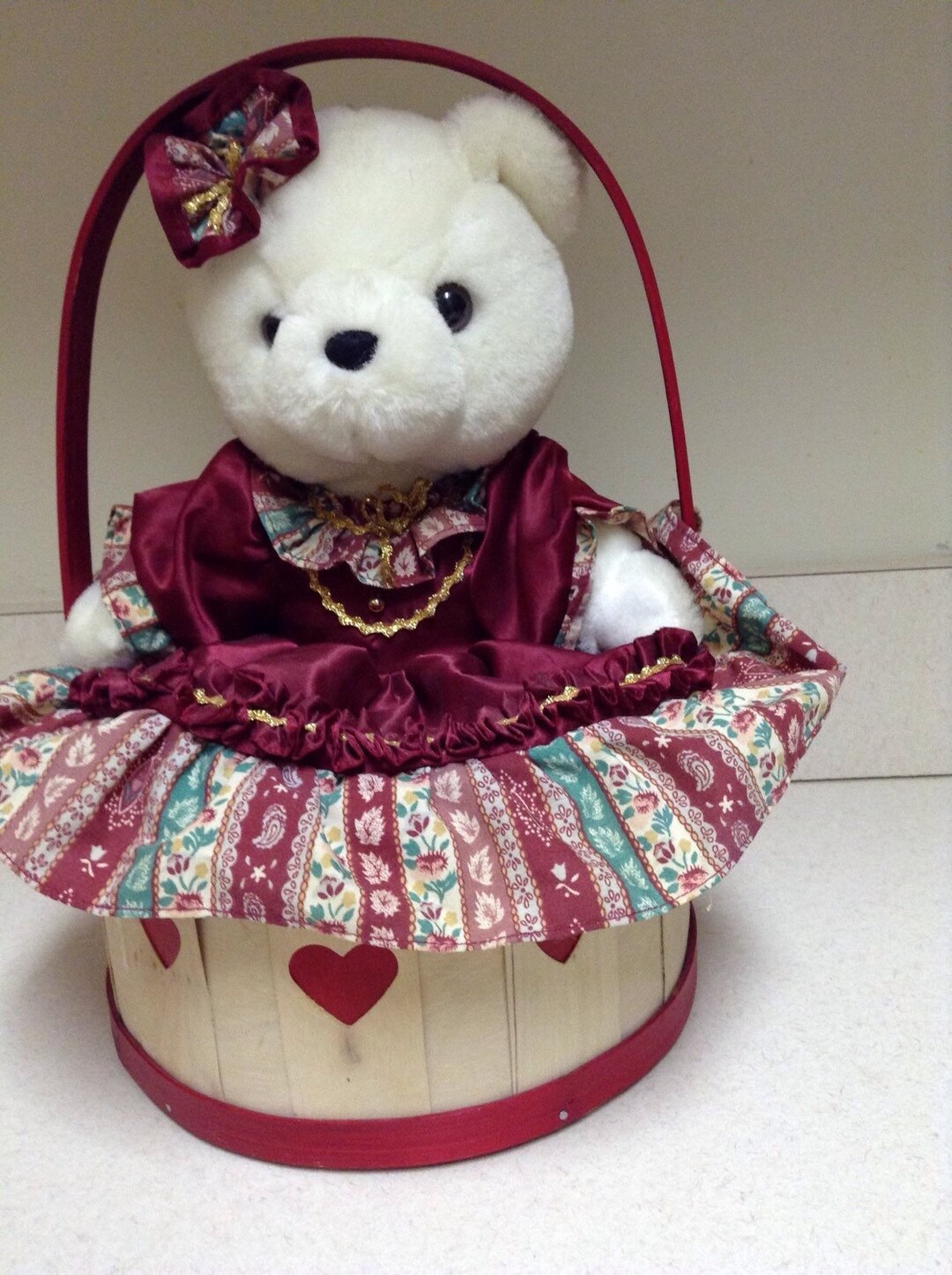 Teddy Bear Beautifully Dressed and Sitting in A Basket Adorned With Red ...
