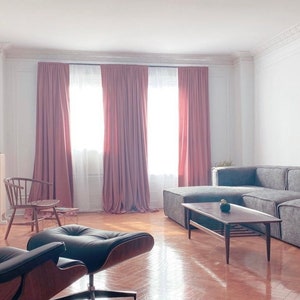 Velvet curtains with top rod pocket in a living room.