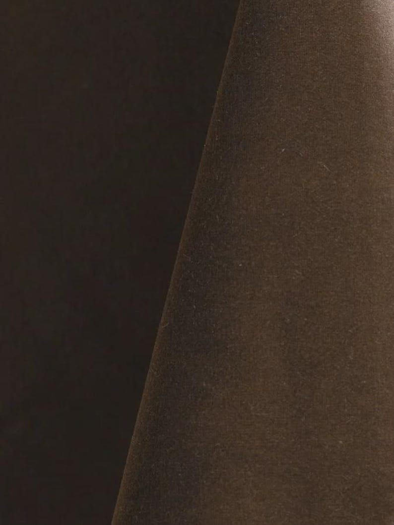 Mink upholstery velvet manufactured by Premier Table Linens. They sell the upholstery velvet by the yard.