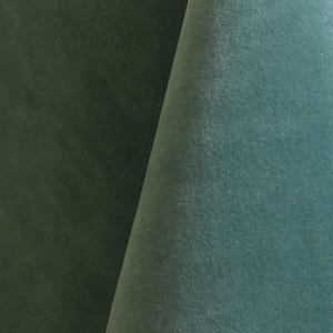 Loden blue upholstery velvet manufactured by Premier Table Linens. They sell the upholstery velvet by the yard.
