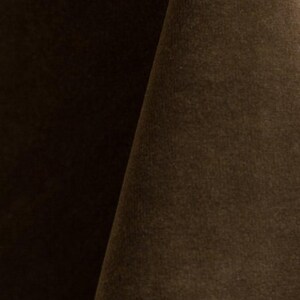 Golden upholstery velvet manufactured by Premier Table Linens. They sell the upholstery velvet by the yard.