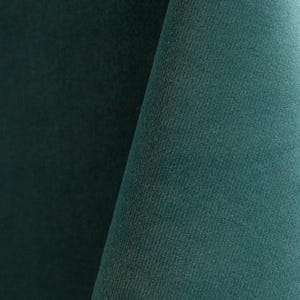 Ocean blue upholstery velvet manufactured by Premier Table Linens. They sell the upholstery velvet by the yard.