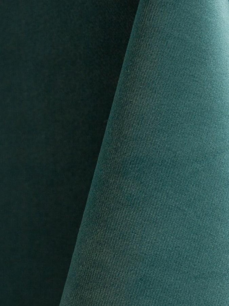 Ocean blue upholstery velvet manufactured by Premier Table Linens. They sell the upholstery velvet by the yard.
