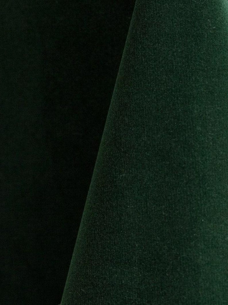 Hunter green upholstery velvet manufactured by Premier Table Linens. They sell the upholstery velvet by the yard.