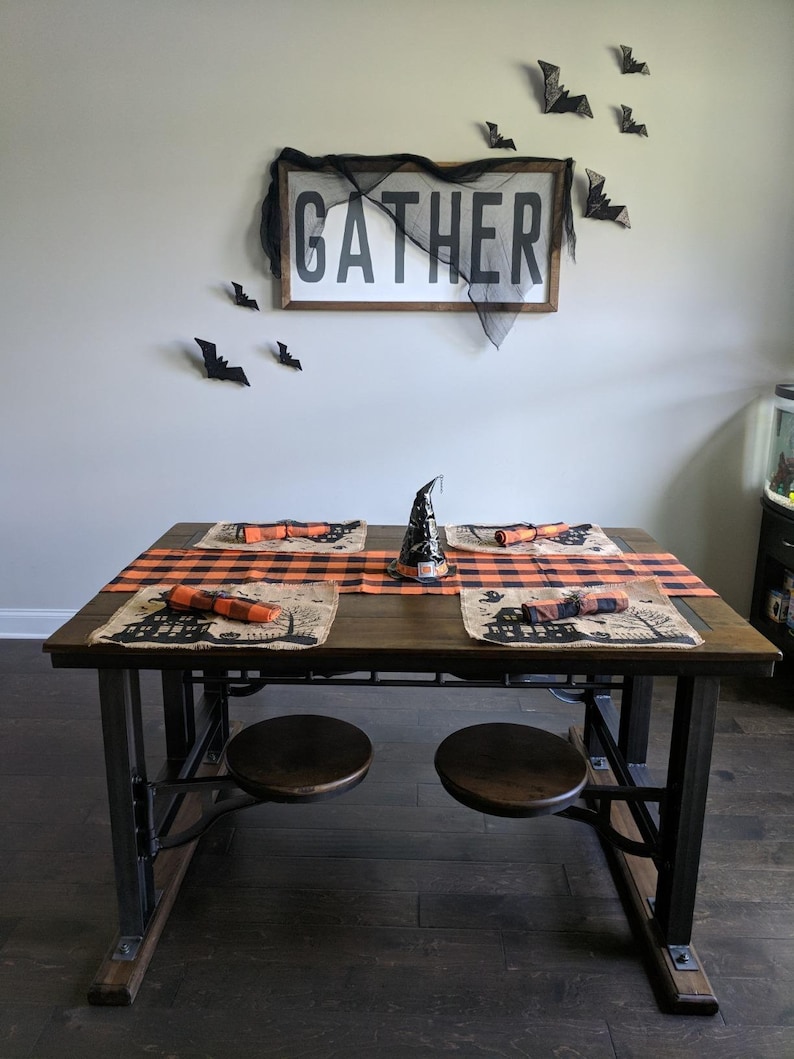 Halloween table runner and placemat with haunted house, witch and ghost.
