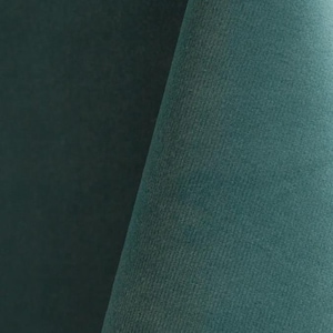 Close-up of a ocean velvet upholstery fabric with a soft, textured surface.
It is 105,000 rub tested which is excellent durable quality manufactured by Premier Table Linens.