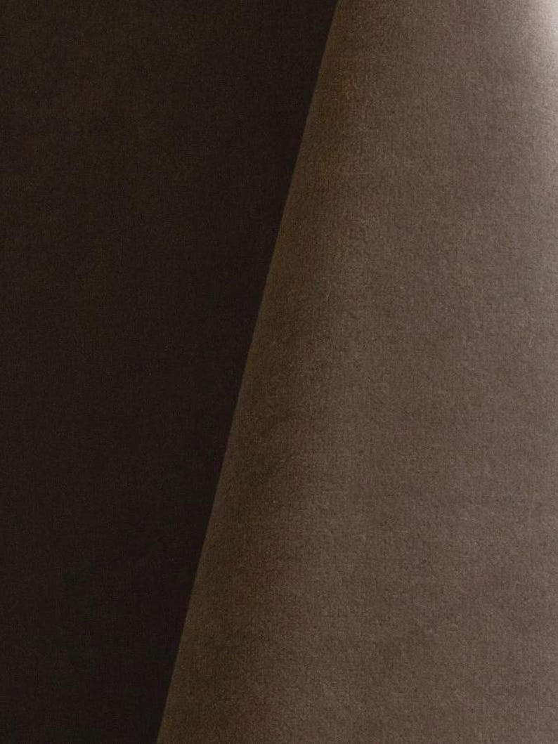 Taupe upholstery velvet manufactured by Premier Table Linens. They sell the upholstery velvet by the yard.
