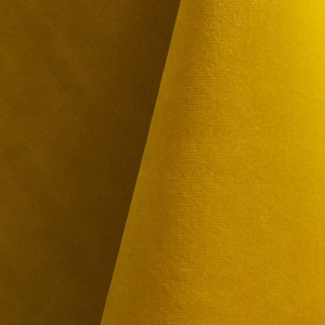 Sunshine yellow upholstery velvet manufactured by Premier Table Linens. They sell the upholstery velvet by the yard.