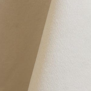 Ivory upholstery velvet manufactured by Premier Table Linens. They sell the upholstery velvet by the yard.