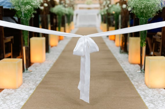 white burlap aisle runner