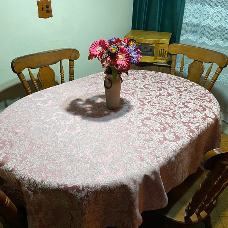 Vintage tablecloth in a country style home dining room