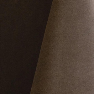 Close-up of a taupe velvet upholstery fabric with a soft, textured surface.
It is 105,000 rub tested which is excellent durable quality manufactured by Premier Table Linens.