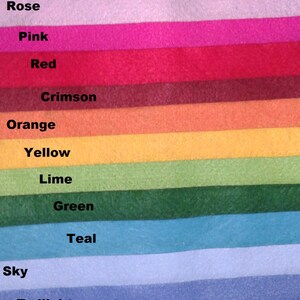 May include: A color chart with 17 different fabric swatches, each labeled with a color name. The colors are arranged in a rainbow order, starting with white and ending with lavender.