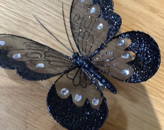 Box of 6 clip on black butterfly’s FREE GIFT with this item