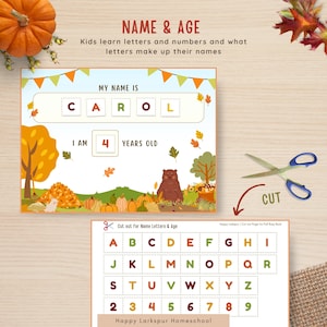 May include: A printable worksheet for kids to learn letters and numbers. The worksheet features a fall theme with a bear, pumpkins, and leaves. The worksheet says "My name is" and has blank spaces for letters. It also says "I am ___ years old" with a blank space for a number. There is a separate sheet with letters and numbers to cut out and paste on the worksheet.