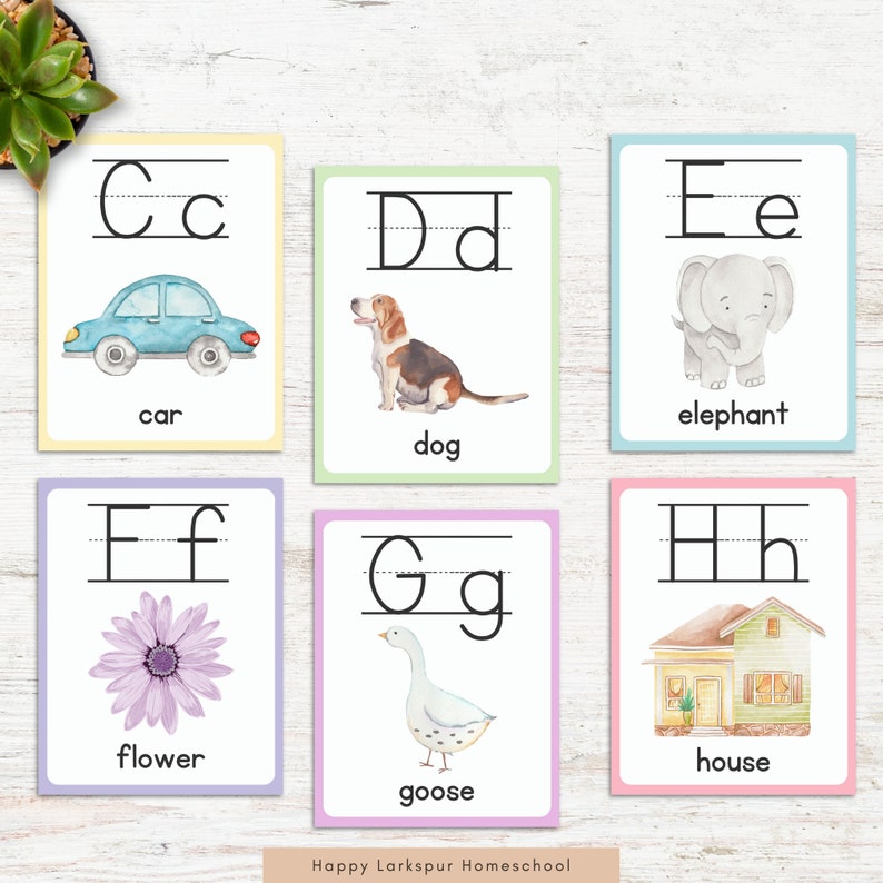 May include: Six colorful flashcards with uppercase and lowercase letters, each featuring a different animal or object. The letters are C, D, E, F, G, and H. The images are a car, dog, elephant, flower, goose, and house.