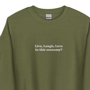 Embroidered live laugh love in this economy sweatshirt