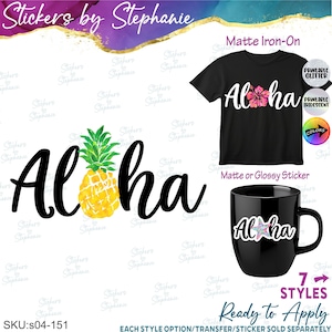 May include: A graphic design featuring the word Aloha with a yellow pineapple replacing the letter o. A black t-shirt displays the text with a pink hibiscus flower, and a black mug shows the text with a multi-colored starfish graphic.