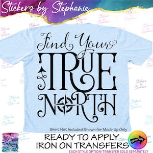 May include: A light blue t-shirt featuring black text that reads Find Your TRUE NORTH with a compass icon integrated into the letter O. The design is a ready to apply iron on transfer. The text Shirt Not Included Shown for Mock-Up Only is visible.