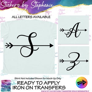 May include: A light blue iron-on transfer featuring a black script letter S intersected by a horizontal arrow. The design includes the text Stickers by Stephanie, ALL LETTERS AVAILABLE, and READY TO APPLY IRON ON TRANSFERS. Examples of letters A and Z are shown.