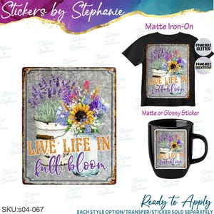 May include: A rectangular metal sign, a black t-shirt, and a black mug, each featuring a floral graphic of lavender and sunflowers in containers with the text "LIVE LIFE IN full bloom". The design includes a rustic gray background and orange and purple text.