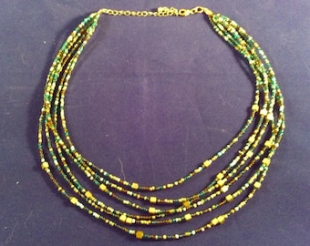 Beautiful multi 6 string Necklace with different small colored beads and little brass Cubes