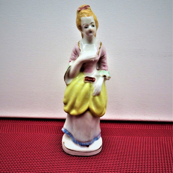 Lady figurine made during the Occupied Japan Era