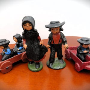 Vintage Cast Iron Amish Family and Wagons Amish Woman and Man with Children Figurines