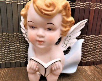 Napco Cherub Angel Reading a Bible porcelain bisque wall hanger
