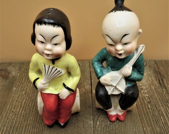 Oriental Chinese Man Woman Sitting Salt and Pepper Shakers