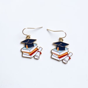 Pendientes de birrete de graduación en oro