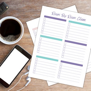 May include: Printable checklist with the title "Room By Room Clean" in purple and teal. The checklist has two columns with checkboxes and lines for writing tasks.