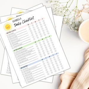 May include: A printable daily checklist for kids with a sun graphic and the name Isabella. The checklist includes tasks for before school, after school, and before bed. Each task has a box to check off for each day of the week.