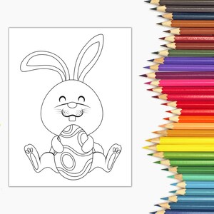 Pode incluir: Um desenho a preto e branco de um coelho a segurar um ovo de P&aacute;scoa. O coelho est&aacute; a sorrir e tem uma express&atilde;o fofa. O ovo est&aacute; decorado com espirais.