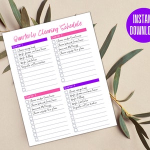 May include: A printable cleaning schedule checklist divided into four quarters. Each quarter has a list of cleaning tasks to be completed, such as cleaning the range hood, washing shower curtains, and vacuuming mattresses. The checklist is labeled "Quarterly Cleaning Schedule" and has a purple "INSTANT DOWNLOAD" label in the top right corner.
