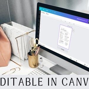 May include: A computer screen displaying a welcome sign template in Canva, a graphic design platform. The template features a welcome message, a list of services, and a five-star rating system. The screen is on a white desk with a gold pencil holder, a pair of scissors, and a pink backpack.
